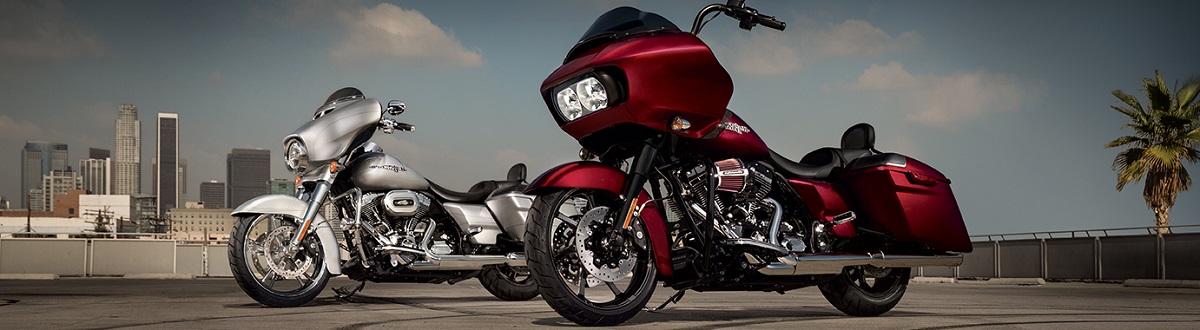 Two motorcycles in the sunset